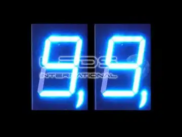 Two blue 7-segment LED digits showing 9.9
